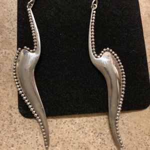 Lightweight Silver long pierced earrings.
